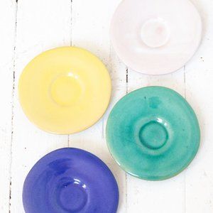 Set of 4 vintage handmade saucers